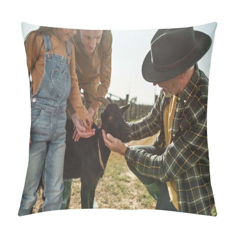 Personality  Caucasian guy and his little sister feeding black goat with carrot with grandfather on farm. Concept of modern countryside lifestyle. Domestic animal care. Agriculture and farming. Warm sunny day pillow covers