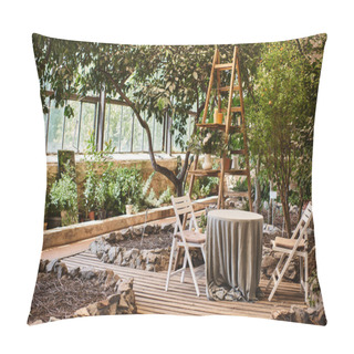 Personality  Beautiful And Modern Greenhouse Interior With Wooden Rack, Garden Chairs And Round Table Pillow Covers