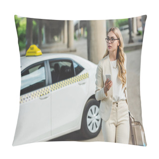 Personality  Young Woman In Eyeglasses Holding Smartphone And Looking Away While Standing Near Taxi Cab On Street Pillow Covers