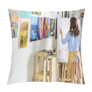 Personality  Rear View Of Left-handed Female Artist Painting On Canvas In Workshop Pillow Covers