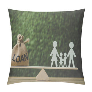 Personality  Money Bag With Loan Inscription And Paper Cut Family Balancing On See Saw On Green Background Pillow Covers