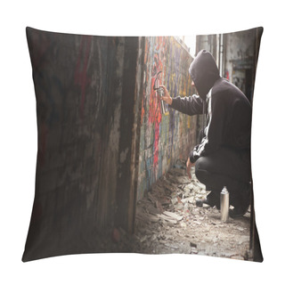 Personality  Illegal Young Man Spraying Black Paint On A Graffiti Wall. Pillow Covers