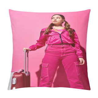 Personality  A Stylish Young Woman In Her 20s, Dressed In Pink, Gracefully Holds A Suitcase In A Studio Against A Pink Background. Pillow Covers