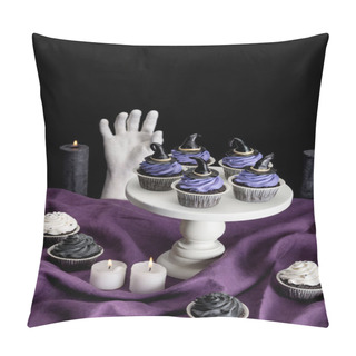 Personality  Tasty Halloween Cupcakes On White Stand Near Burning Candles And Decorative Hand On Purple Cloth Isolated On Black Pillow Covers