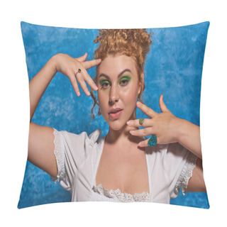 Personality  Headshot Of Redhead Plus Size Model In Stylish Attire Posing With Hands Near Face On Blue Backdrop Pillow Covers