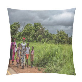 Personality  Malange / Angola - 12 08 2018: View Of A Group At Young Girls Walking Along Roadside, Tropical Landscape As Background Pillow Covers