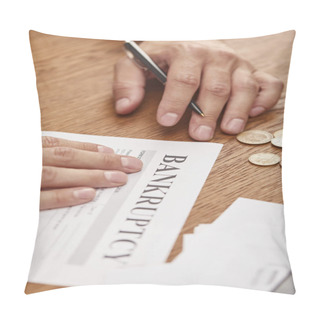 Personality  Partial View Of Businessman Filling In Bankruptcy Form At Wooden Table With Coins Pillow Covers
