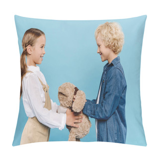 Personality  Side View Of Smiling And Cute Kids Holding Teddy Bear Isolated On Blue  Pillow Covers
