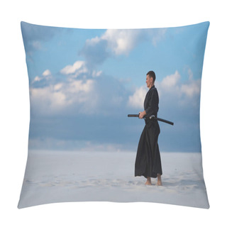 Personality  Concentrated Man, In Traditional Japanese Clothes, With Sword, Katana, Is Training Martial Arts In Desert During Sunset - Samurai On The Blue Cloudy Sky Background. Side View. Pillow Covers