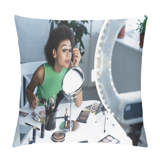 Personality  Pretty African American Blogger Applying Mascara Near Mirror, Gadgets And Decorative Cosmetics At Home  Pillow Covers