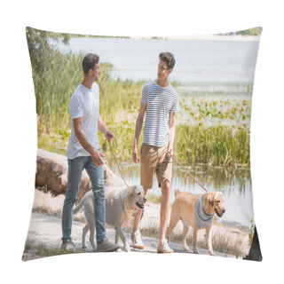 Personality  Father And Son Looking At Each Other And Holding Leashes While Walking With Golden Retrievers Near Lake  Pillow Covers