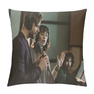 Personality  Singers Performing Song While Man Playing Piano Behind Pillow Covers