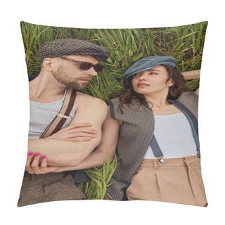 Personality  Top View Of Fashionable Romantic Couple In Newsboy Caps, Suspenders And Vintage Outfits Looking At Each Other While Lying And Relaxing On Grassy Field, Stylish Partners In Rural Escape Pillow Covers