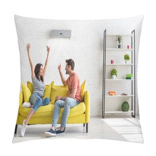 Personality  Happy Man And Woman Talking While Sitting On Yellow Sofa Under Air Conditioner At Home Pillow Covers
