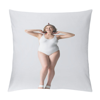 Personality  Full Length Of Cheerful Overweight Young Woman In Swimwear And Earrings Smiling While Posing On White Pillow Covers
