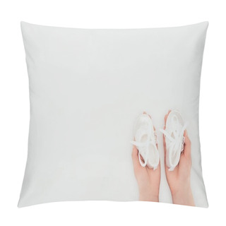 Personality  Cropped Image Of Woman Holding White Baby Shoes Isolated On White Pillow Covers