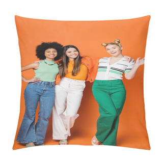 Personality  Full Length Of Smiling And Stylish Blonde Teen Girl Waving At Camera While Standing Near Multiethnic Girlfriends With Bright Makeup On Orange Background, Trendy Outfits And Fashion-forward Looks Pillow Covers