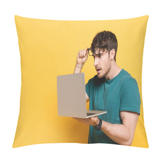 Personality  Shocked Young Man Touching Eyeglasses While Looking At Laptop On Yellow Pillow Covers