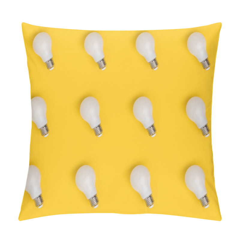 Personality  full frame of arrangement of light bulbs isolated on yellow pillow covers