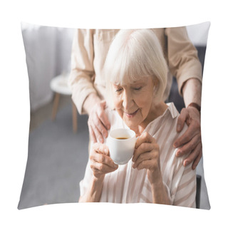 Personality  Selective Focus Of Senior Man Embracing Wife With Cup Of Coffee At Home  Pillow Covers