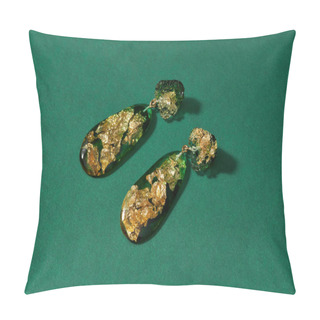 Personality  Closeup Shot Of Dangle Earrings Made Of Epoxy Resin With Golden Foil Inside Isolated Over Green Background Pillow Covers