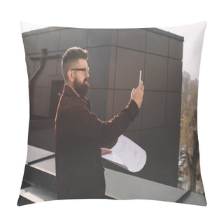 Personality  Serious Adult Male Architect In Glasses Taking Photo And Holding Blueprint On Rooftop Pillow Covers