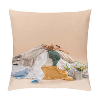 Personality  Stack Of Clothing Near Watering Can With Flowers On Beige Background, Environmental Saving Concept Pillow Covers