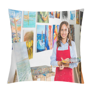 Personality  Attractive Female Artist Holding Painting Brush And Palette Near Canvas In Workshop Pillow Covers