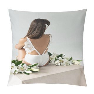 Personality  Back View Of Tender Young Woman In White Lacy Bodysuit Sitting Near Lilies Isolated On White Pillow Covers