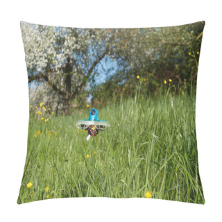 Personality  Small And Blue Drone With White Protective Bar, Hovers Reliably Over Green Meadows, Buttercups And Apple Trees Can Be Seen.Nuertingen, Germany Pillow Covers