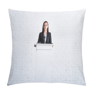 Personality  Beautiful, Confident Lecturer Standing On Podium Tribune Near White Brick Wall Pillow Covers