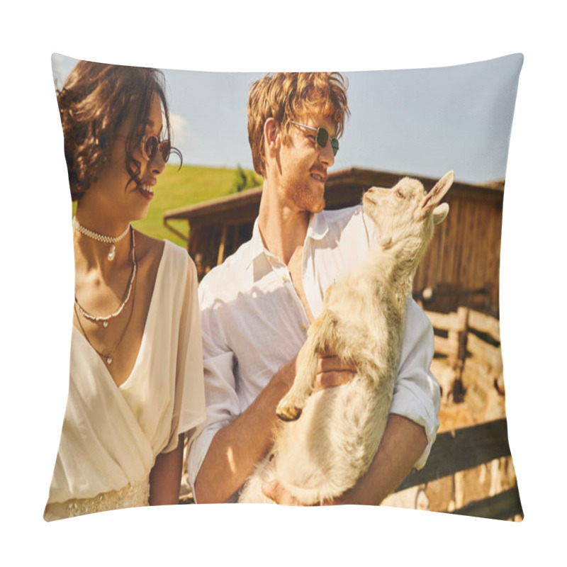 Personality  just married couple, redhead groom cuddling baby goat near asian bride in white dress, boho style pillow covers