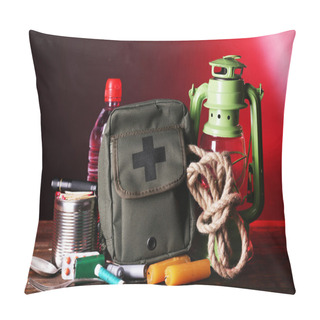 Personality  Emergency Preparation Equipment On Wooden Table, On Dark Background Pillow Covers