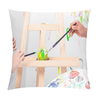 Personality  Close Up Of Adult Couple Painting Green Apple On Easel With Paintbrushes Pillow Covers