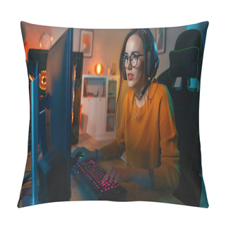 Personality  Excited Gamer Girl In Headset With A Mic Playing Online Video Game On Her Personal Computer. She Talks To Other Players. Room And PC Have Colorful Warm Neon Led Lights. Cozy Evening At Home. Pillow Covers