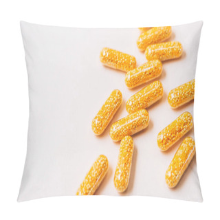 Personality  Close-up Shot Of Yellow Medical Capsules On White Pillow Covers