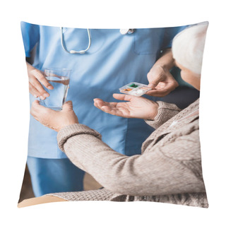 Personality  Cropped View Of Nurse Giving Pills And Glass Of Water To Senior Woman, Blurred Background Pillow Covers