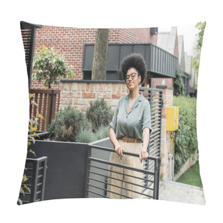 Personality  African American Property Agent Smiling Near Fence And Green Plants Next To Urban House Pillow Covers