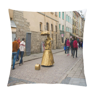 Personality  LVIV, UKRAINE - MAY 1, 2017: Street Artists Dressed In Golden Dress With Umbrella On The Lviv Downtown Main Square Pillow Covers