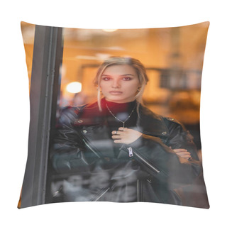 Personality  Blonde Young Woman In Black Leather Jacket Looking At Camera Through Glass Window In New York  Pillow Covers