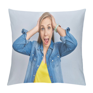 Personality  Young Blonde Woman Standing Over Blue Background Crazy And Scared With Hands On Head, Afraid And Surprised Of Shock With Open Mouth  Pillow Covers