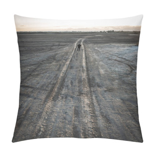 Personality  Unrecognized Person Hiking On A Deserted Rural Road At Sunset In A Dry Lake. Concept Of Environmental Ecological Climate Change. Pillow Covers