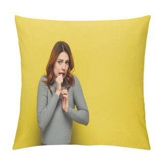 Personality  Anxious Woman Looking At Camera While Holdings Hands Near Face On Yellow Pillow Covers