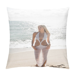 Personality  A Young, Blonde Woman Elegantly Stands On Top Of A Sandy Beach In Miami, Gazing At The Horizon. Pillow Covers