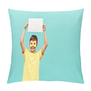Personality  Smiling Multiracial Boy In Yellow Superhero Costume With Mask Holding Blank Paper Above Head On Blue Background, International Children's Day Concept  Pillow Covers