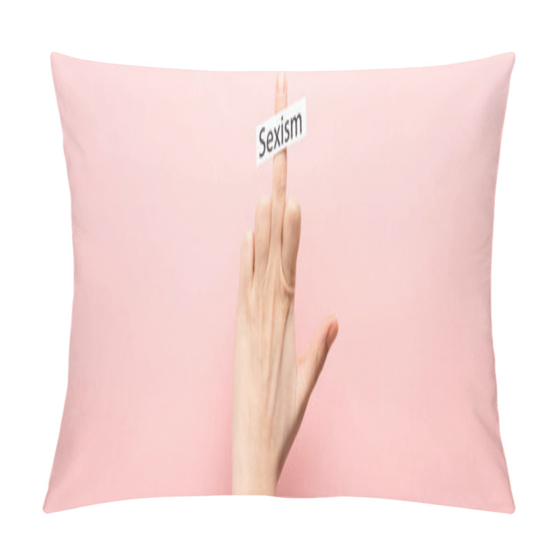 Personality  panoramic shot of woman showing middle finger and card with sexism lettering on pink background  pillow covers