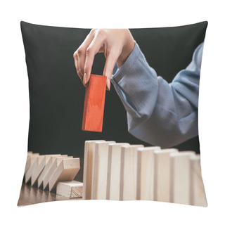 Personality  Cropped View Of Woman Picking Red Wooden Brick From Row Of Blocks Isolated On Black Pillow Covers