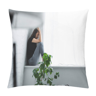 Personality  Selective Focus Of Depressed Young Woman Crying While Sitting On Window Sill And Holding Hands On Head Pillow Covers