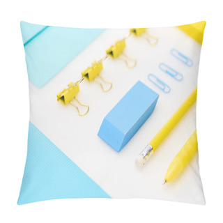 Personality  Flat Lay Of Blue Eraser, Paper Clips, Folder, Envelope, Yellow Pen, Pencil, Stickers In White Background Pillow Covers