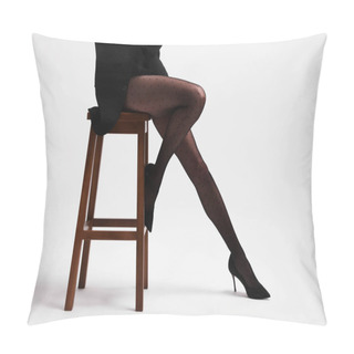 Personality  Beautiful Woman In Stylish Black Outfit On Stool Against White Background, Closeup Pillow Covers